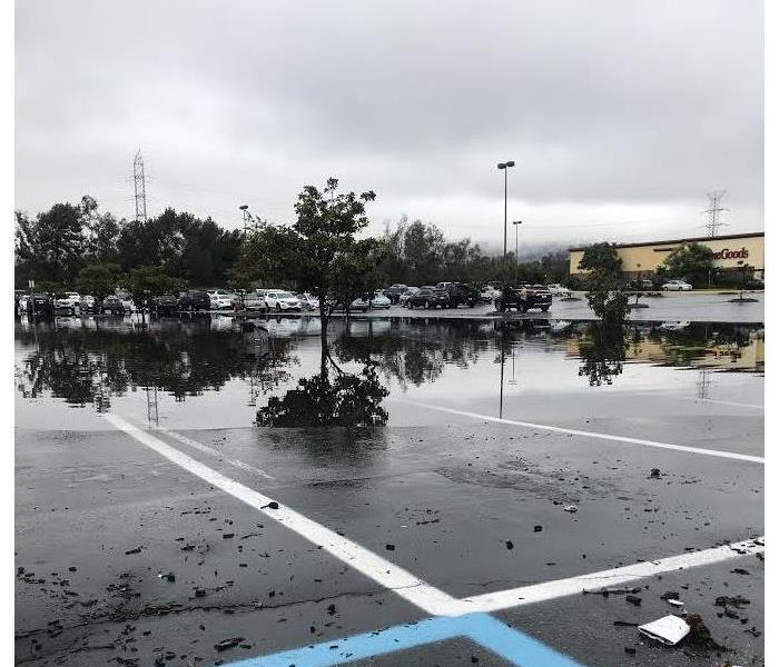 Parking lot flooded after rain